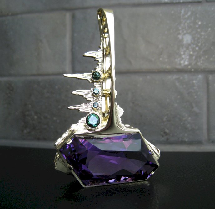 Gold pendant with 96 carat African amethyst and tourmalines.