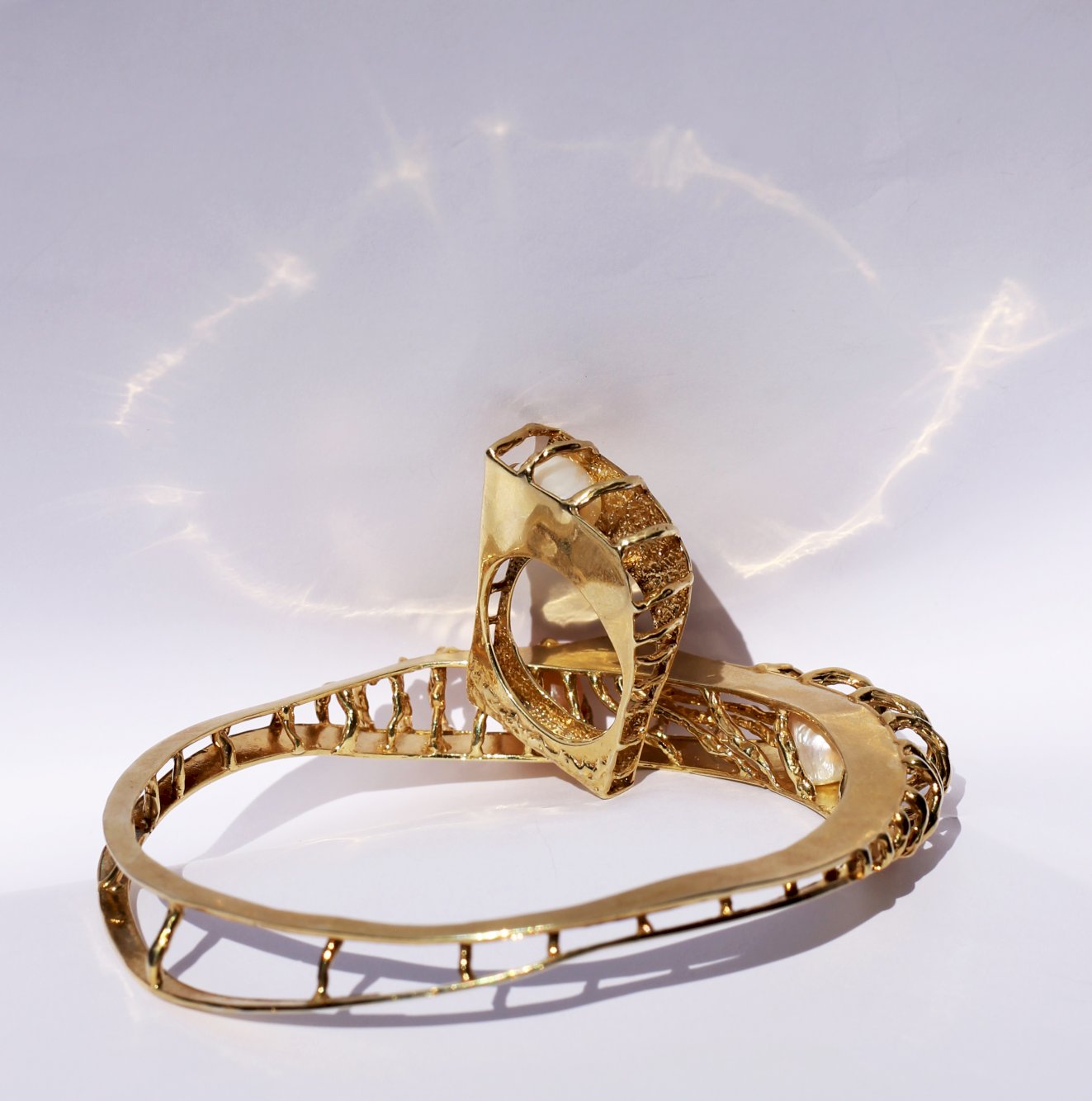 Cage armlet and Cage ring